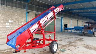 TRAILER MOUNTED ELEVATING CONVEYOR