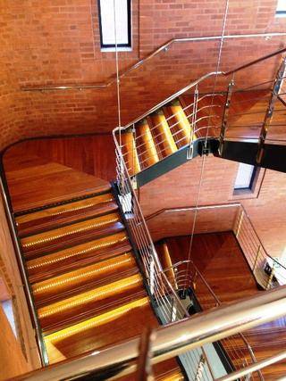 MILD STEEL POWDER COATED STAIRCASE WITH MAHOGANY STAIR TREADS