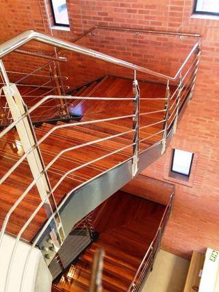 STAIRCASE WITH GRADE 316 STAINLESS STEEL HANDRAILS